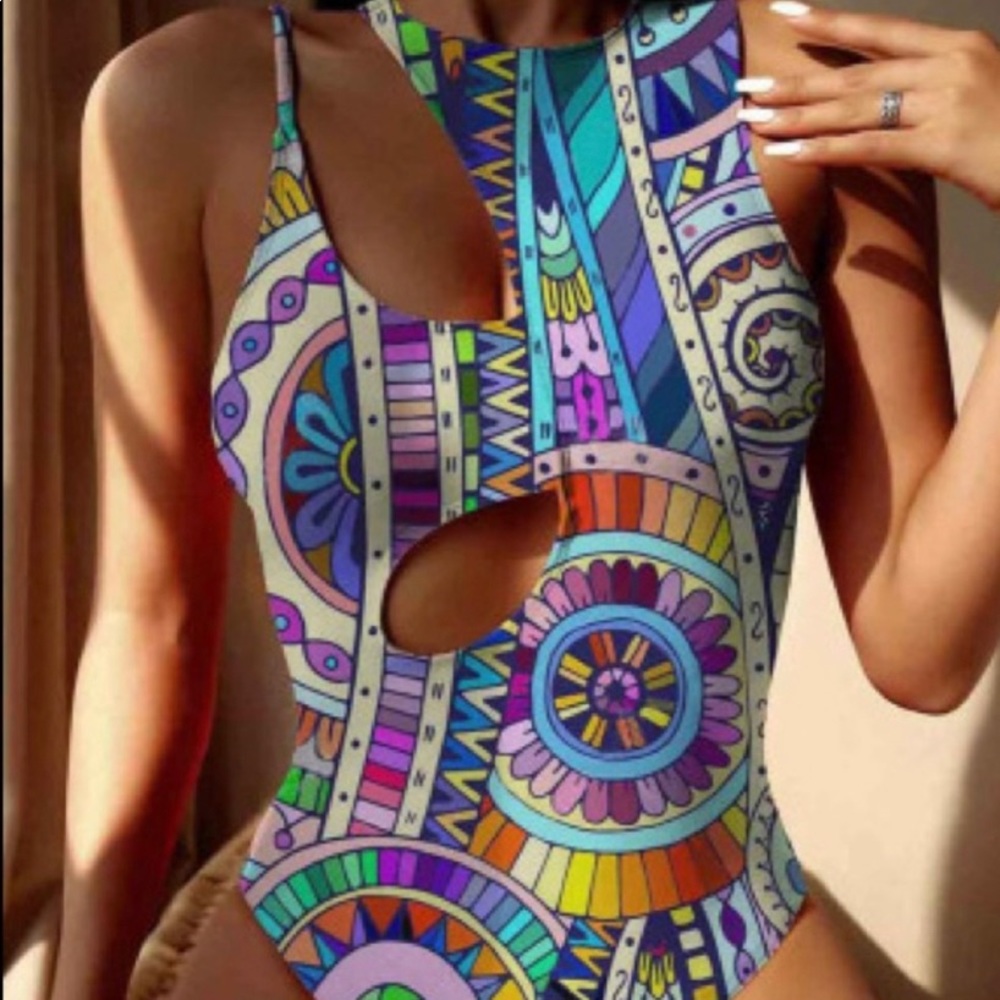 NWT Gorgeous brightly colored graphics. One piece
